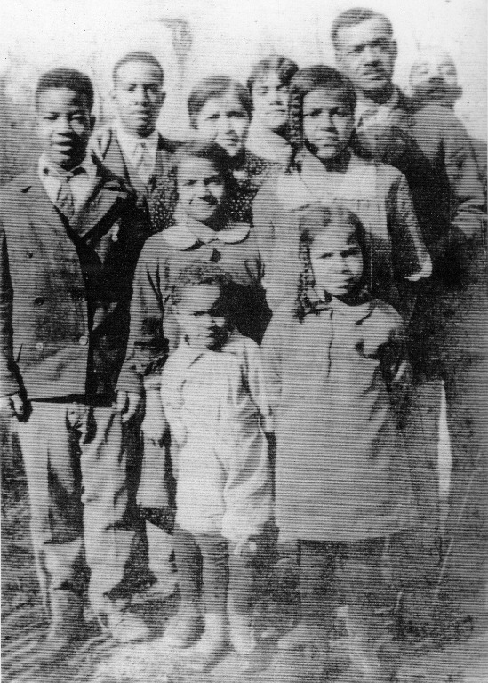 (left to right) Front row: Wilmer Bill Clifford, Mary Helen Clifford Middle row: Beulah Louise Clifford, Virginia Thornton Clifford Back row: Robert Charles Clifford, Eugene Kent Clifford, Coralie Satilphia (Kent) Clifford, Clara Clifford, Charles Bernard
